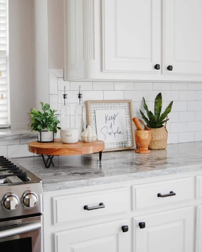 Kitchen Countertop With Greenery and Wood Décor