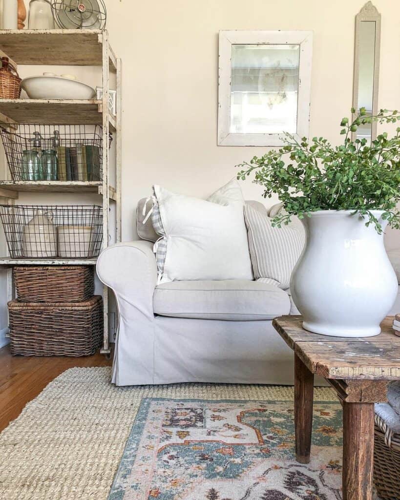 Layered Rugs Beneath a Slipcovered Sofa