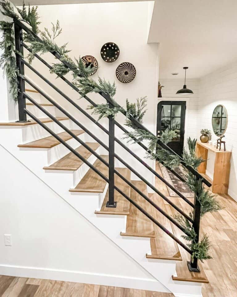 Light Floorboard Stairs With Black Rail