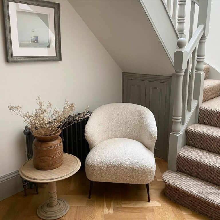 Light Grey Banister and a Beige Carpet