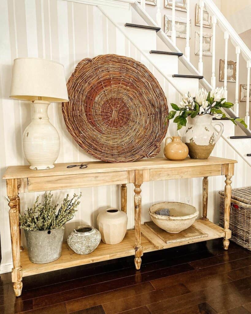 Light Wood Console Table With Round Basket Décor