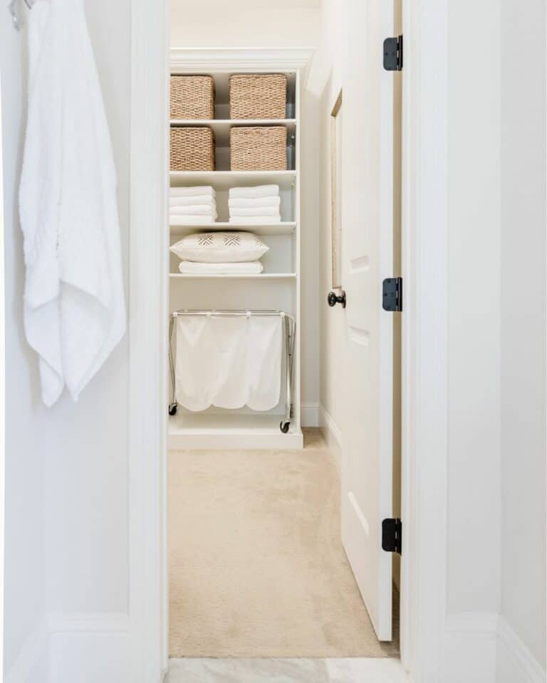 Linen Closet With White Shelving Unit