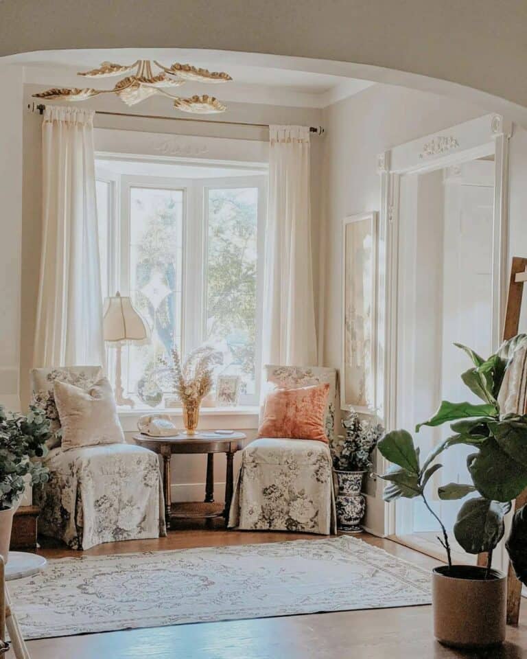Living Room Bay Window With White Trim and Bench Seating