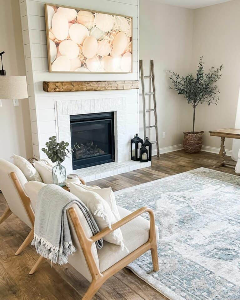 Living Room With Elegant White Fireplace