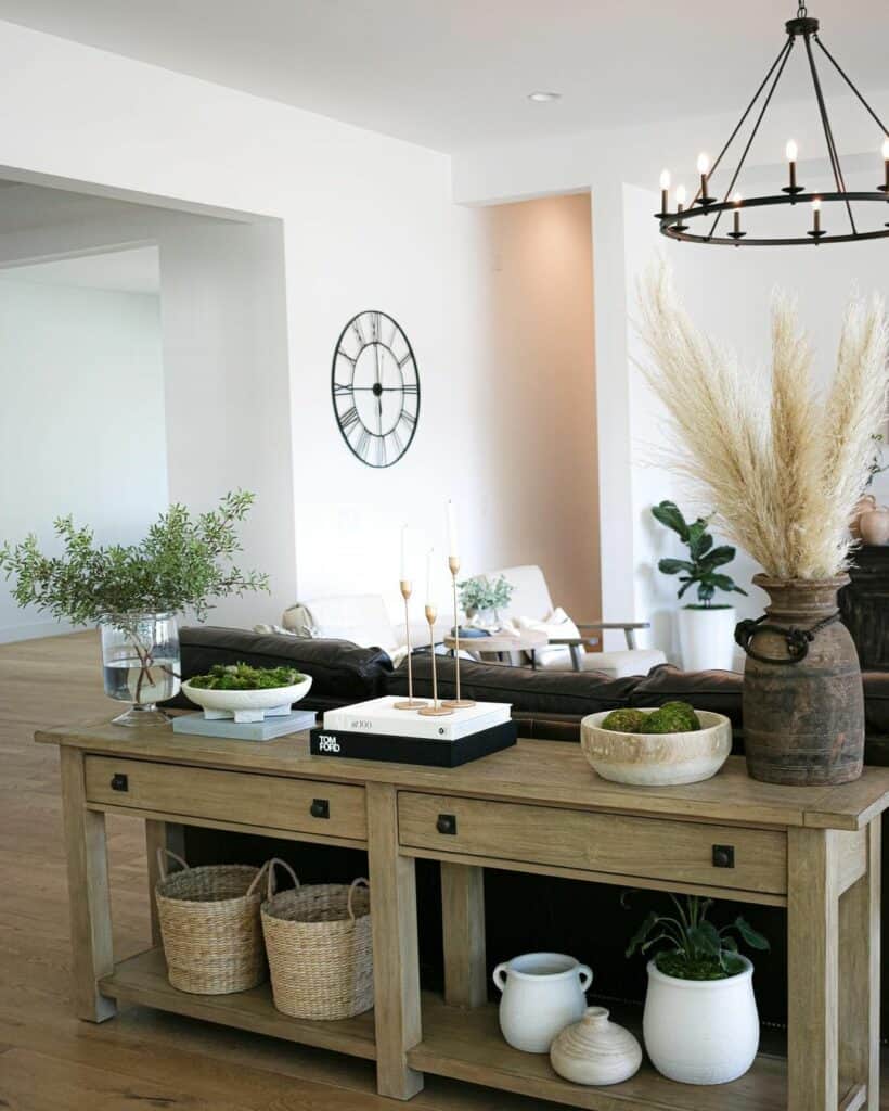 Living Room With a Black-accented Farmhouse Chandelier