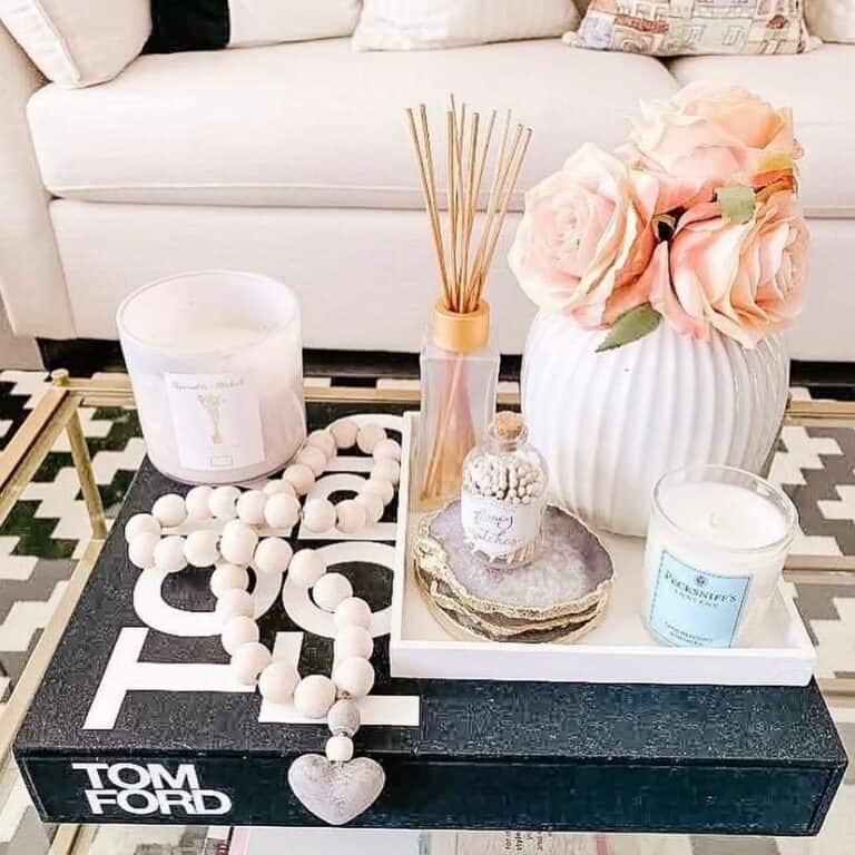 Living Room With a Golden-accented Glass Coffee Table