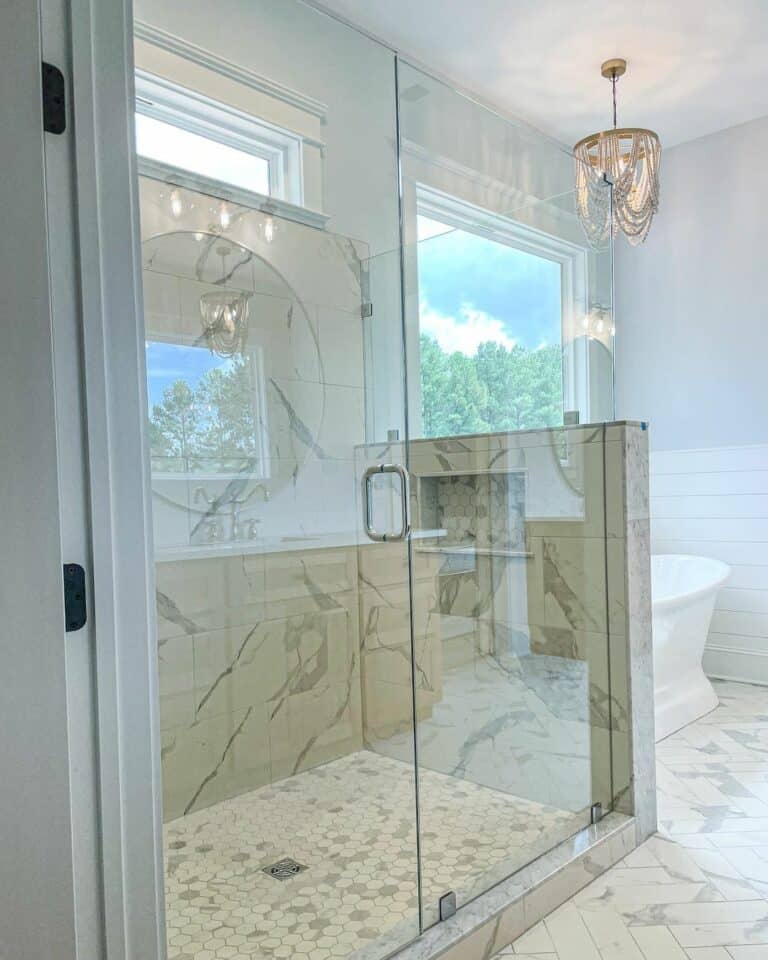 Luxury Master Bathroom With a Marble Tile Shower