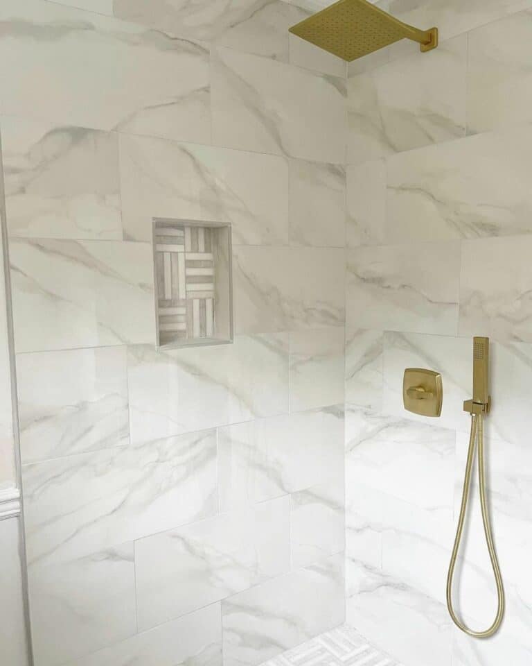 Marble Shower With Gold Fixtures