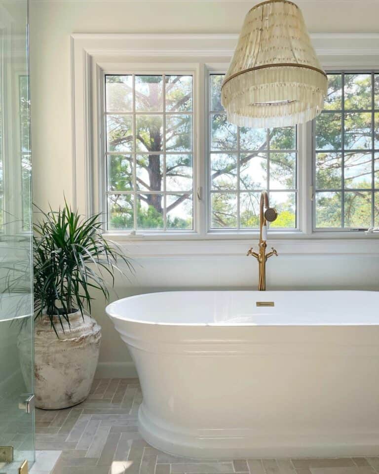 Master Bathroom With Herringbone Stone Tile Floors