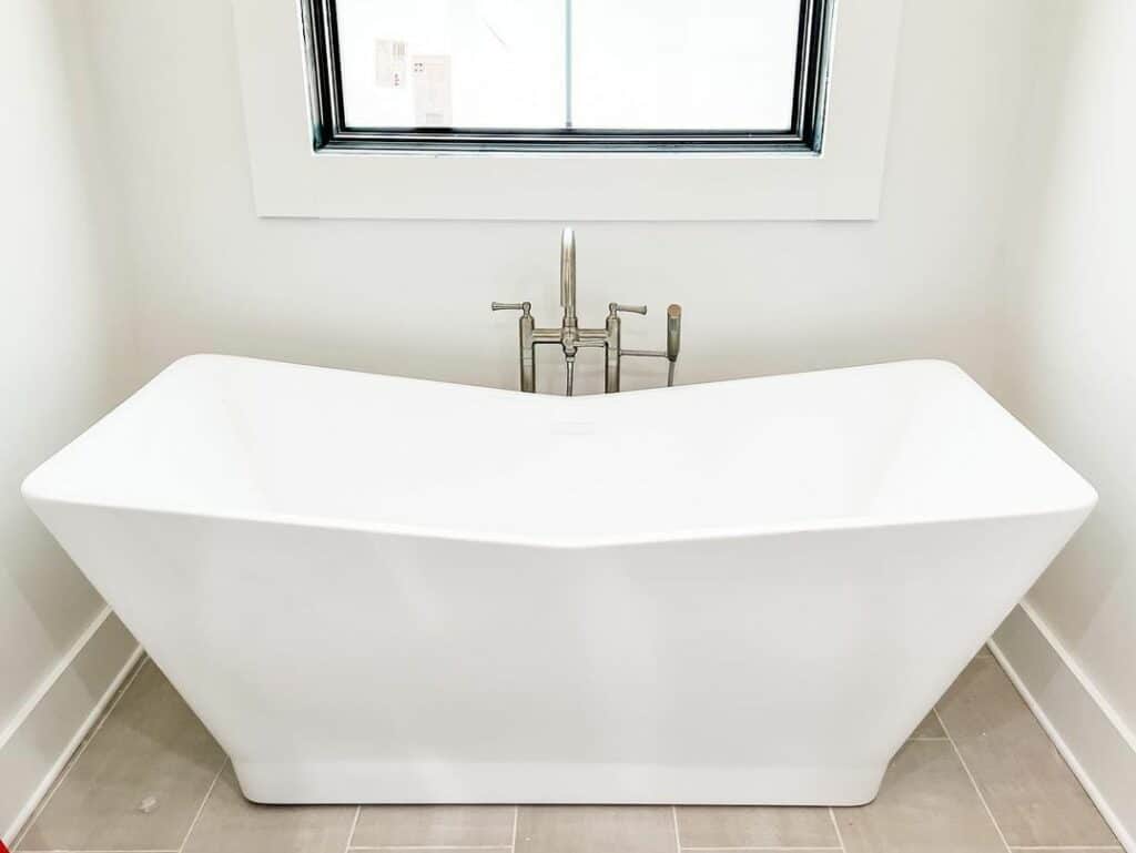 Master Bathroom With Modern White Tub