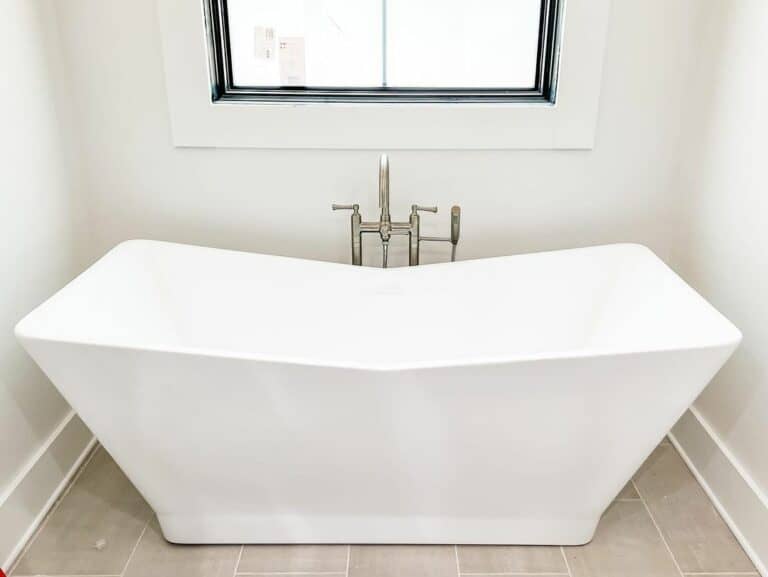 Master Bathroom With Modern White Tub