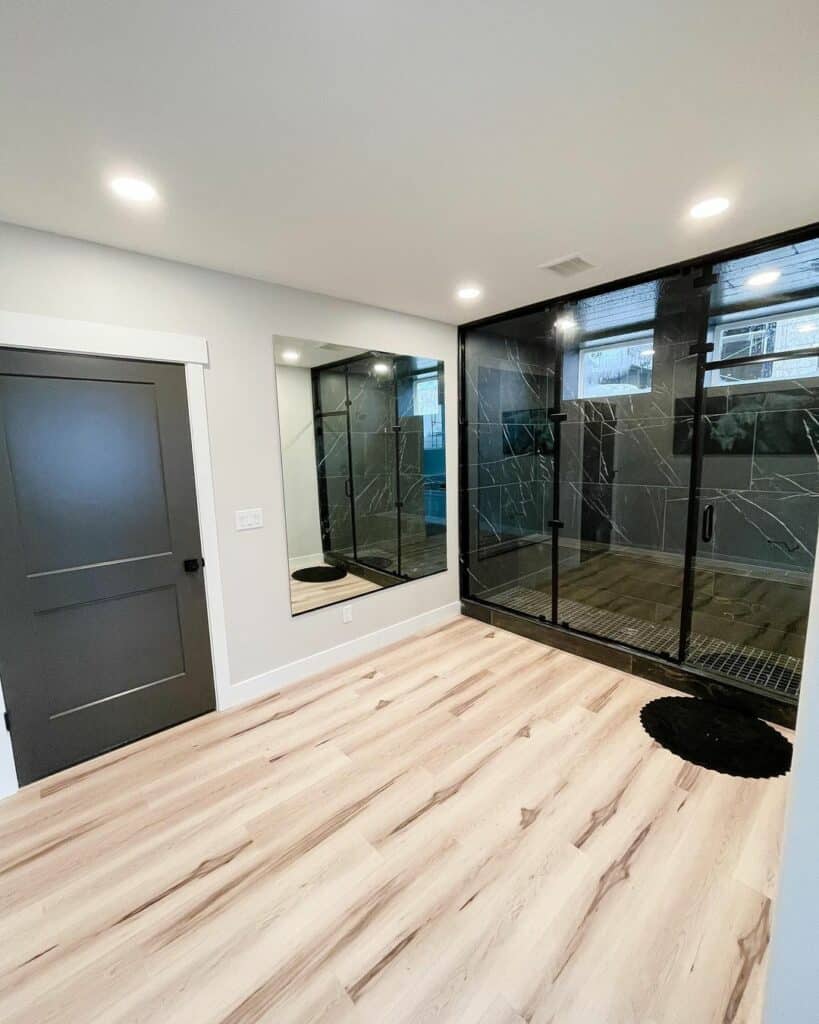 Master Bathroom With a Luxury Black Marble Shower Soul & Lane