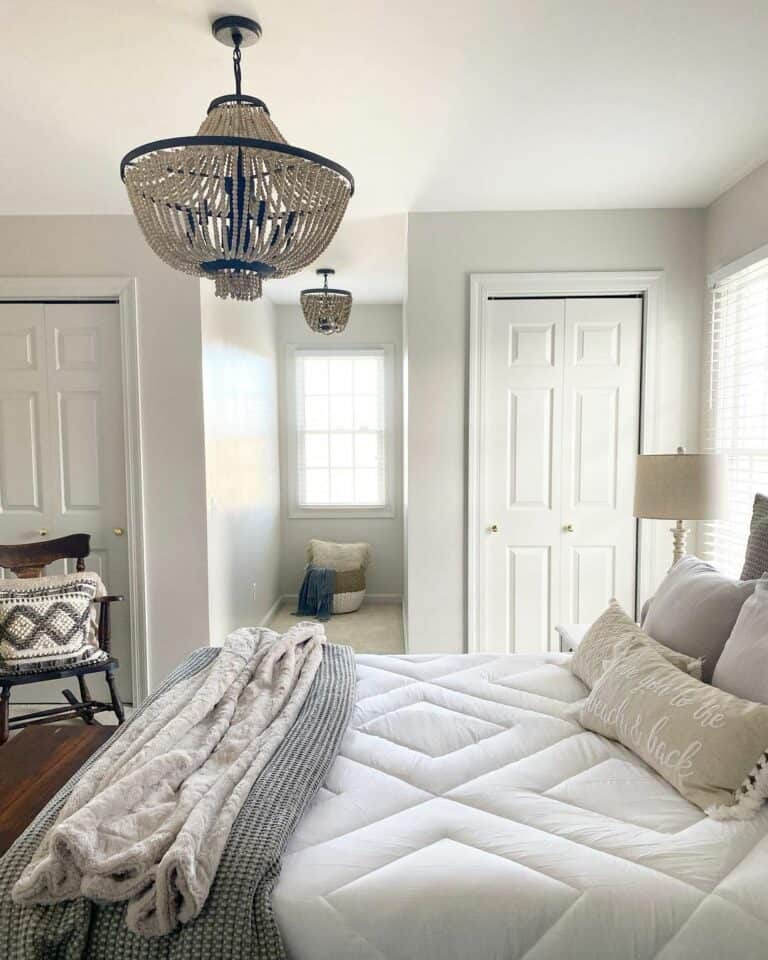 Master Bedroom With Rustic Chandeliers