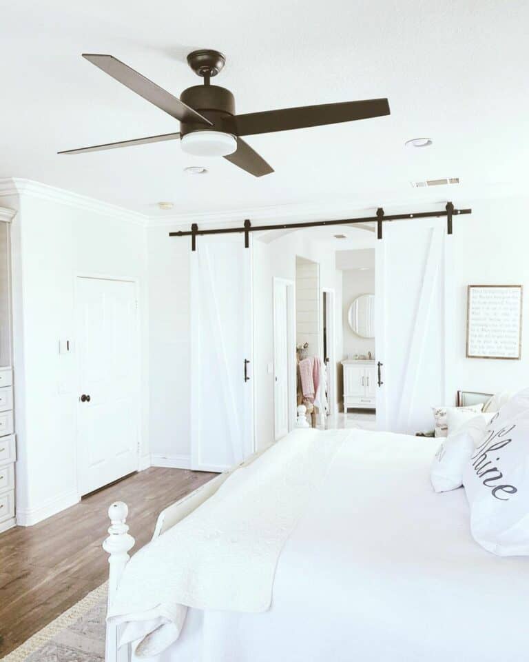 Master Bedroom With White Sliding Barn Door