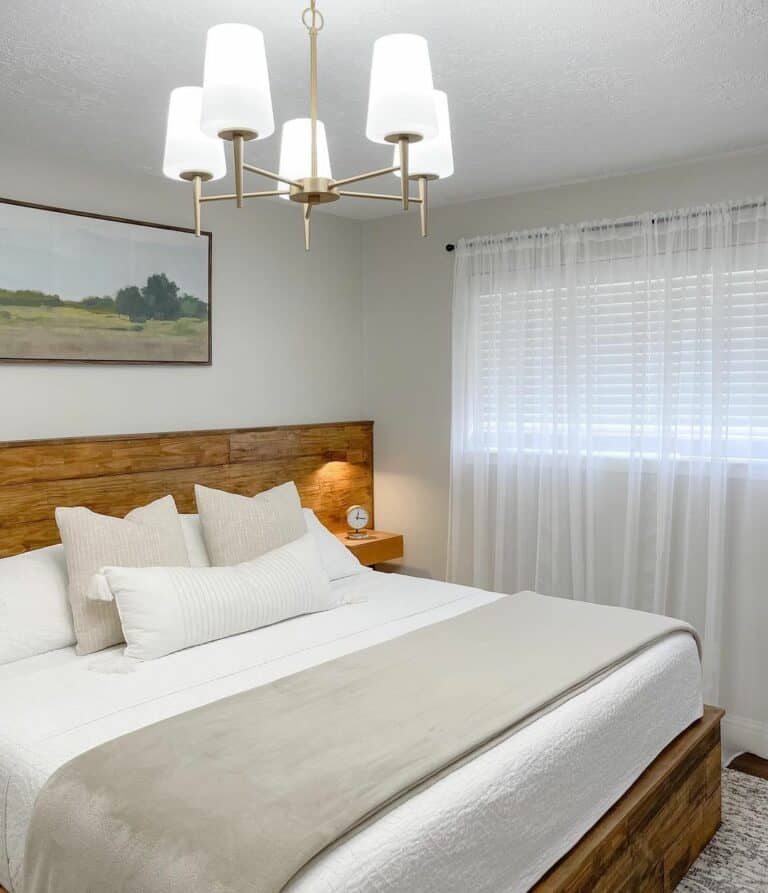 Master Bedroom With Wooden and Golden Accents