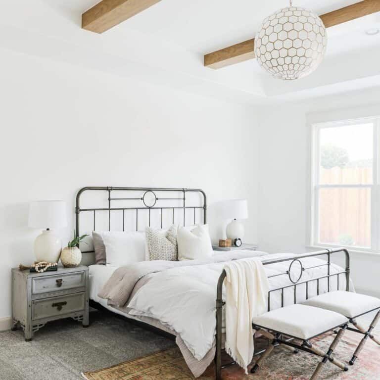 Minimalist Farmhouse Master Bedroom With Wooden Beams