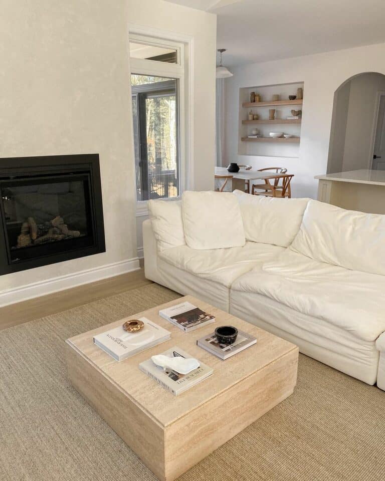 Minimalist Living Room With Textured Fireplace
