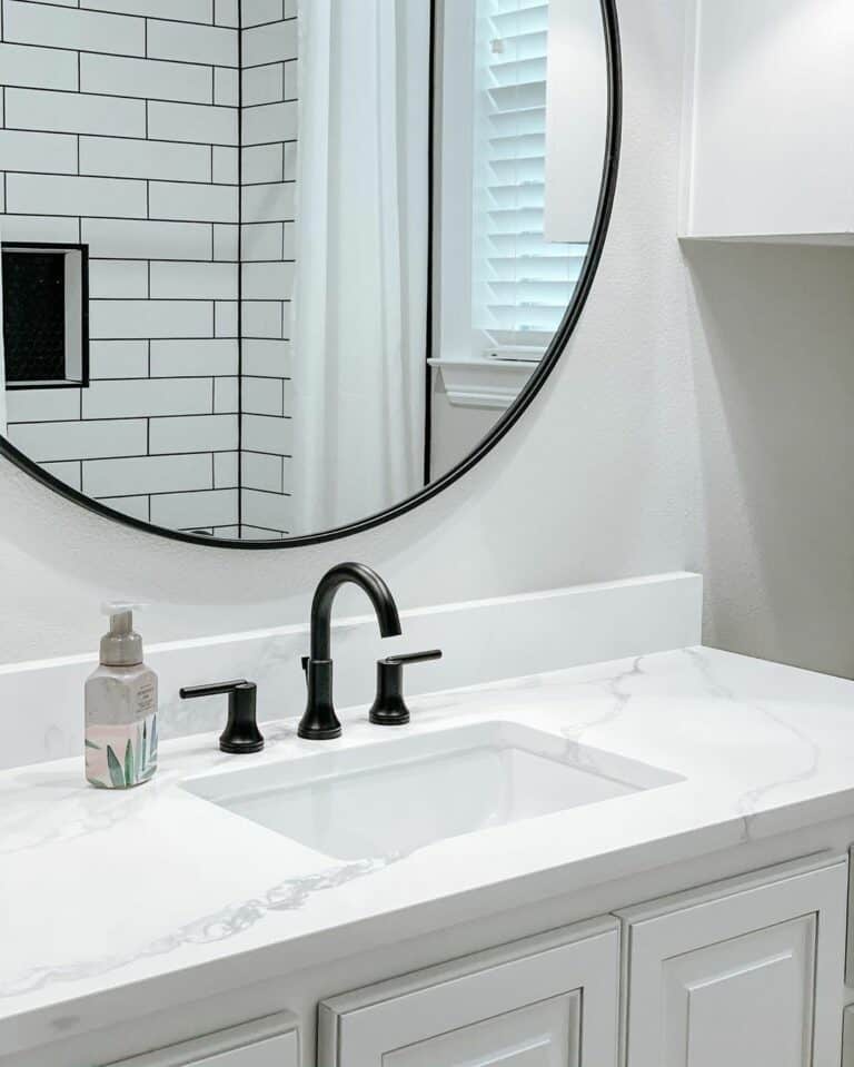 Minimalist White Bathroom With Black Accents