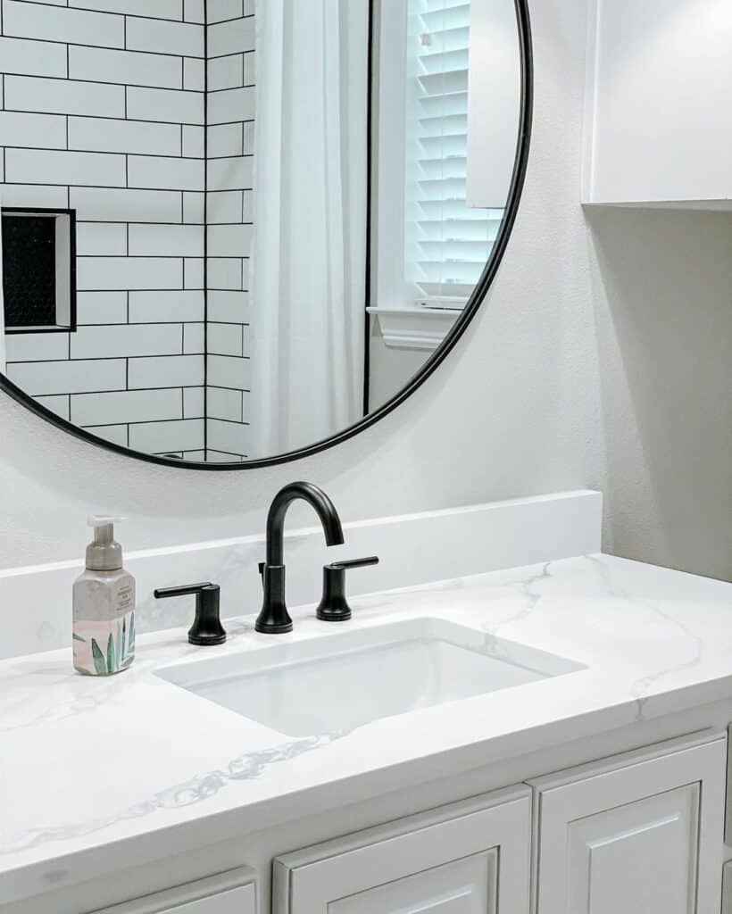 Minimalist White Bathroom With Black Accents
