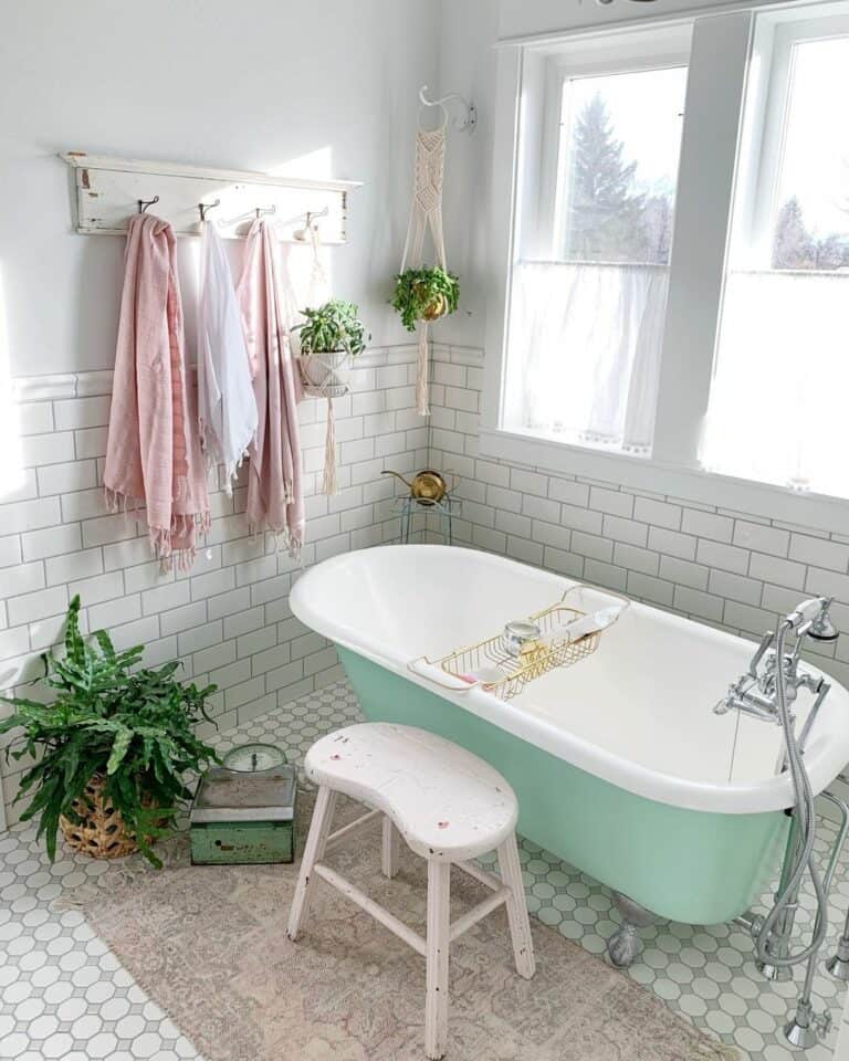 Mint Green Clawfoot Bathtub and Subway Tile