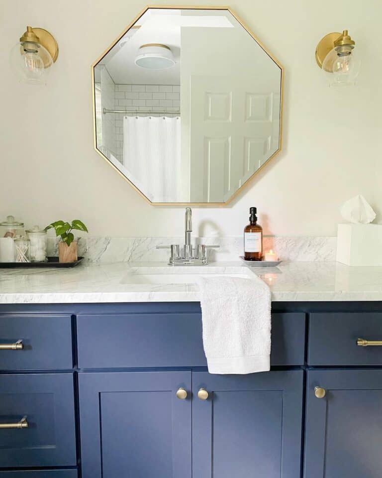 Modern Marble Bathroom With Navy Cabinets