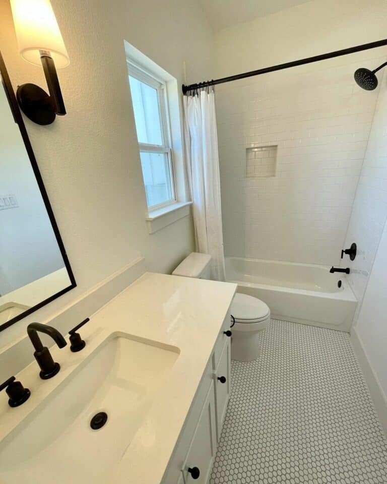 Modern Minimalist Bathroom With Black Accents