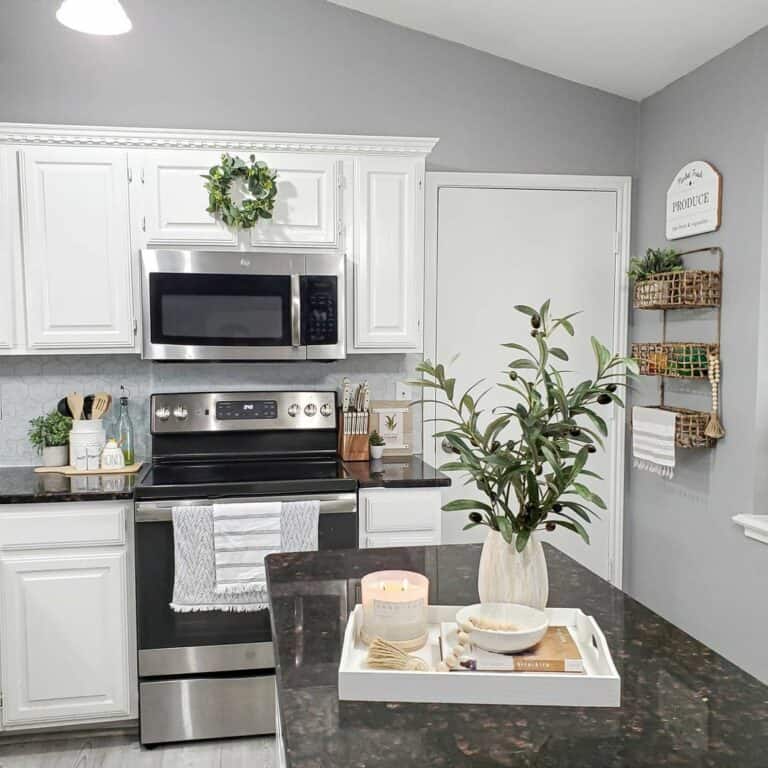 Modern White Kitchen With Black Counters