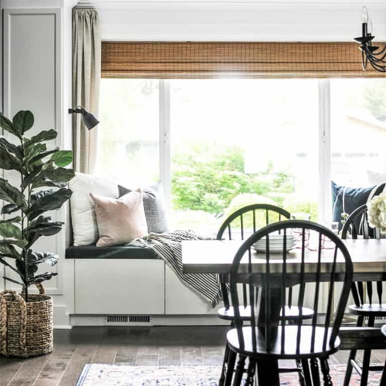 Modern White Window Seat With a Black Cushion