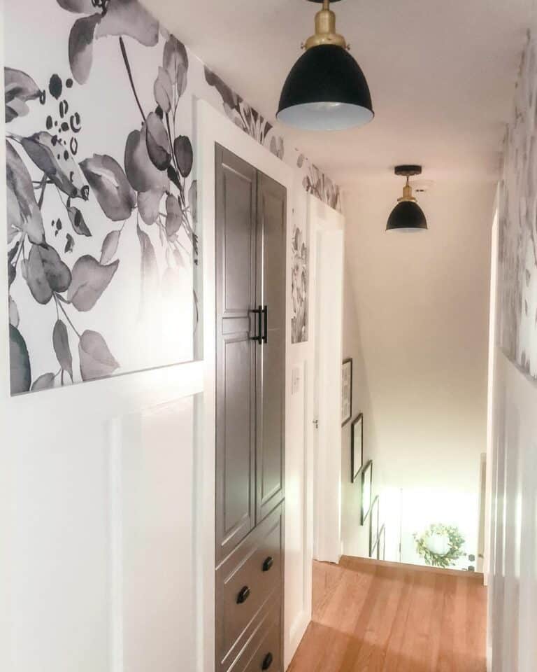 Monochromatic Hallway With a Built-in Black Cabinet