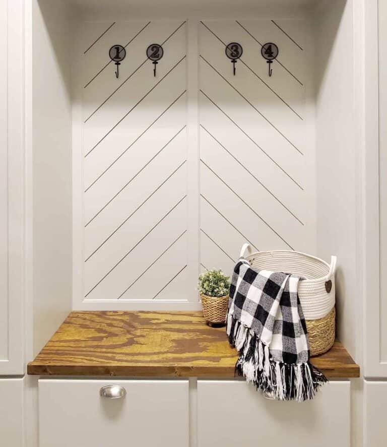 Mudroom Built-in Storage Space With a Chevron Accent Wall