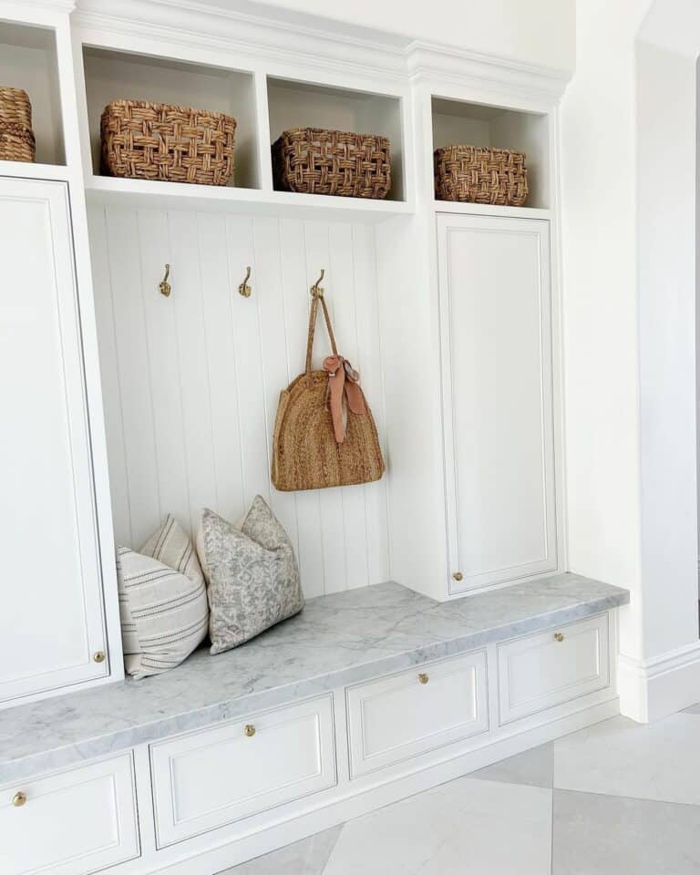 Mudroom Built-in Storage With a Marble Topped Bench