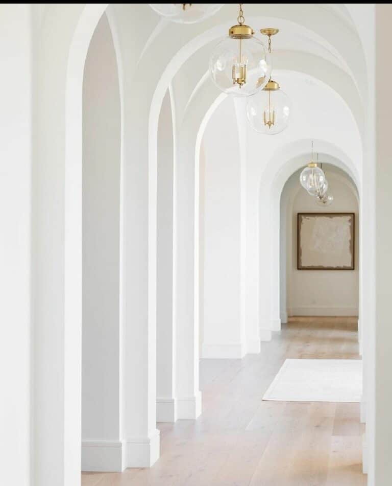 Multiple Archways Within a Bright Hallway