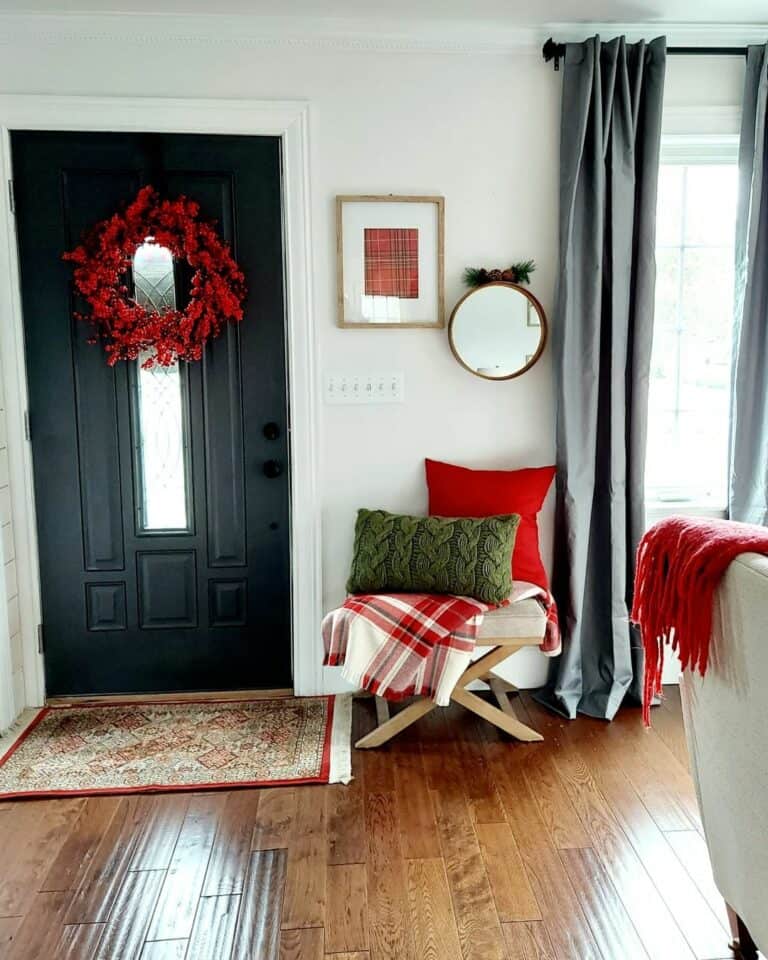 Neutral Entryway With Accents of Red and Black