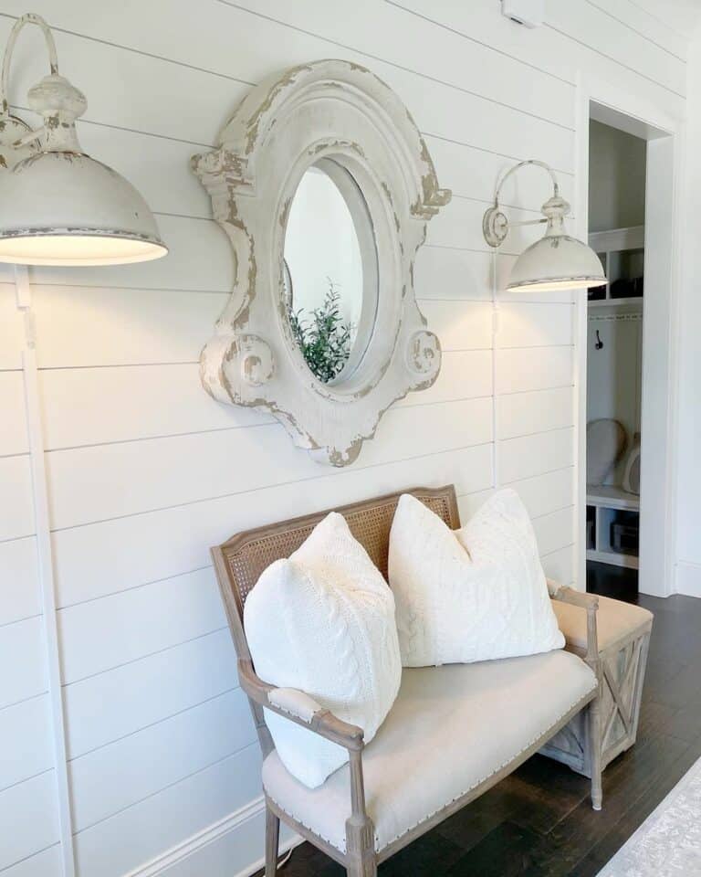 Neutral Padded Bench With White Vintage Wall Décor
