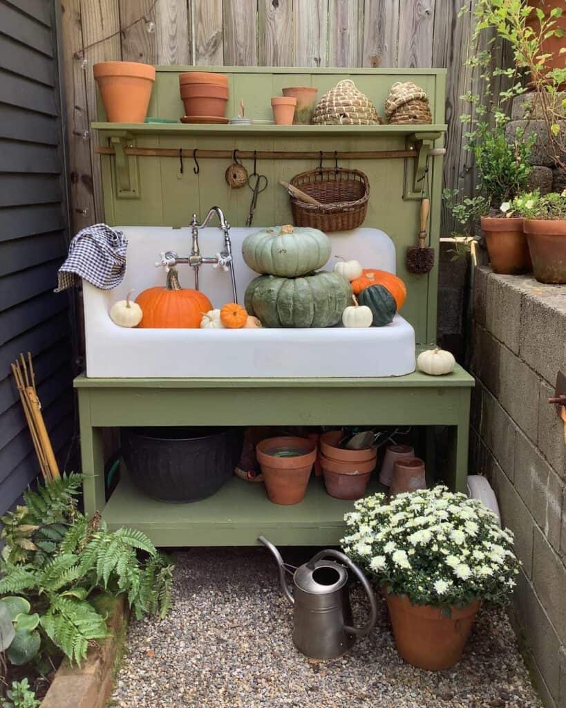 Olive Green Potting Bench in Compact Garden
