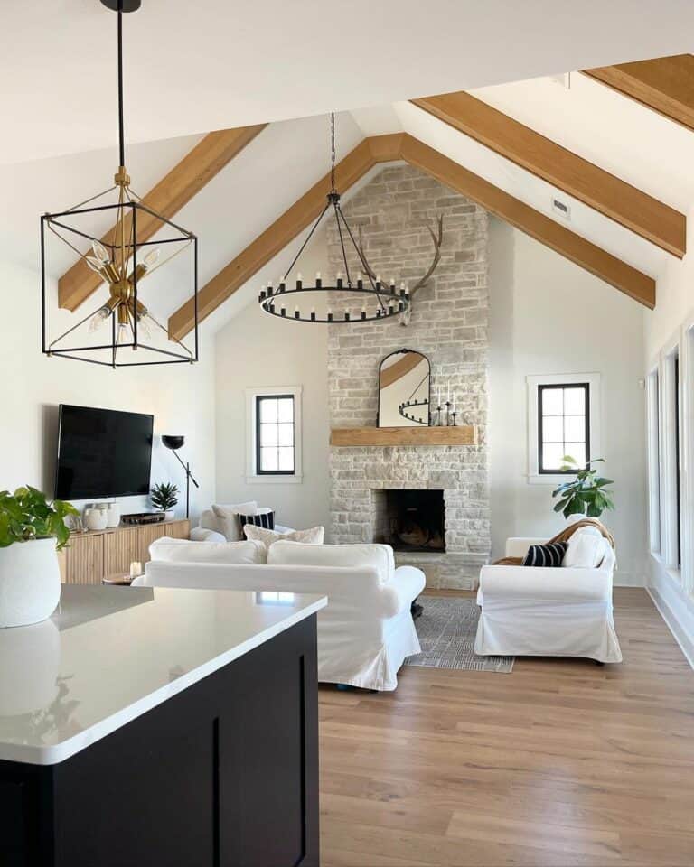 Open Concept Living Room and Kitchen With Stone Fireplace