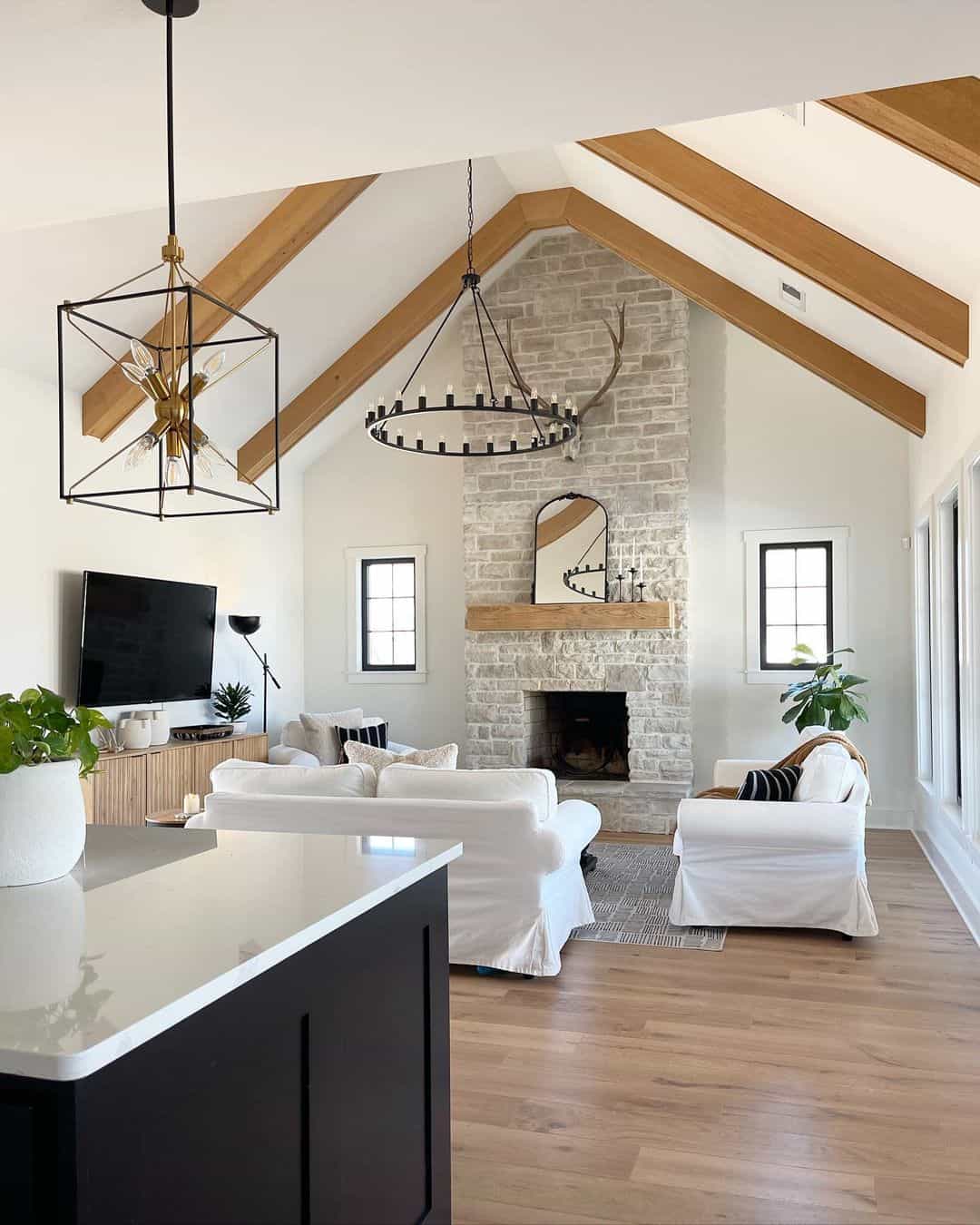 Open Concept Living Room and Kitchen With Stone Fireplace - Soul & Lane