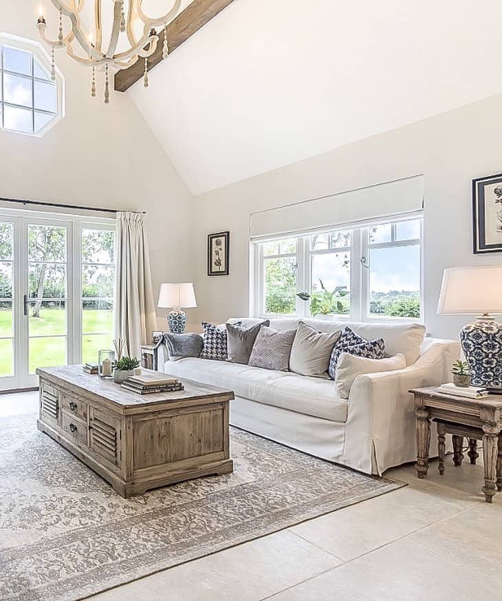 Open Living Room With Luxurious Long Ivory Couch