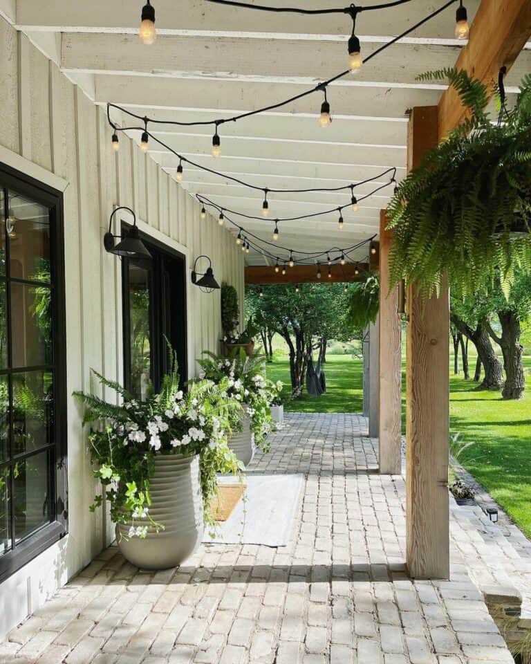 Open-concept Porch With Brick Paving