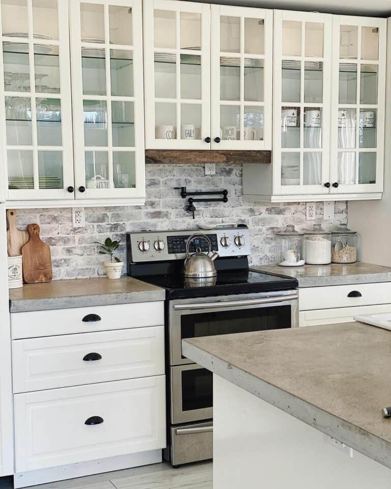 Opulent White Farmhouse Kitchen With Windowpane Cabinetry