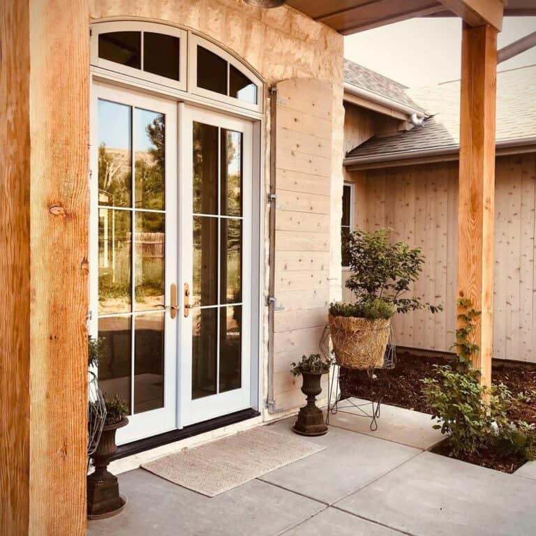 Outdoor Patio With White French Door