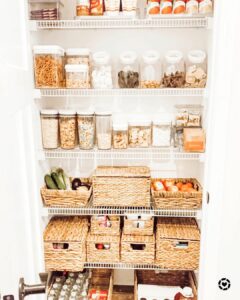 Pantry Closet Filled With Woven Baskets