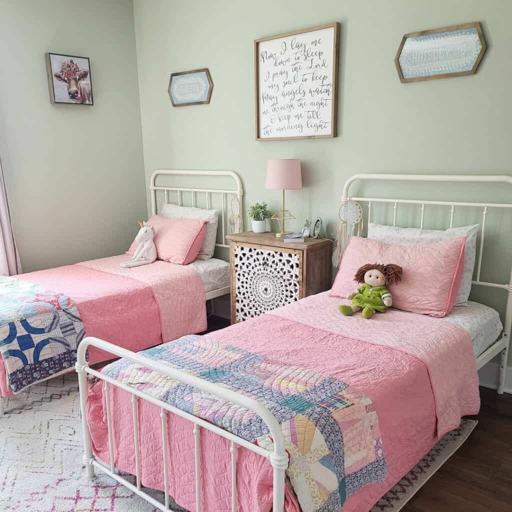 Pink Bedding on White Framed Beds