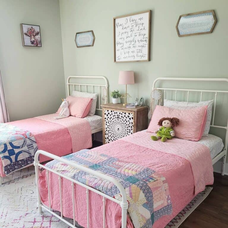 Pink Bedding on White Framed Beds