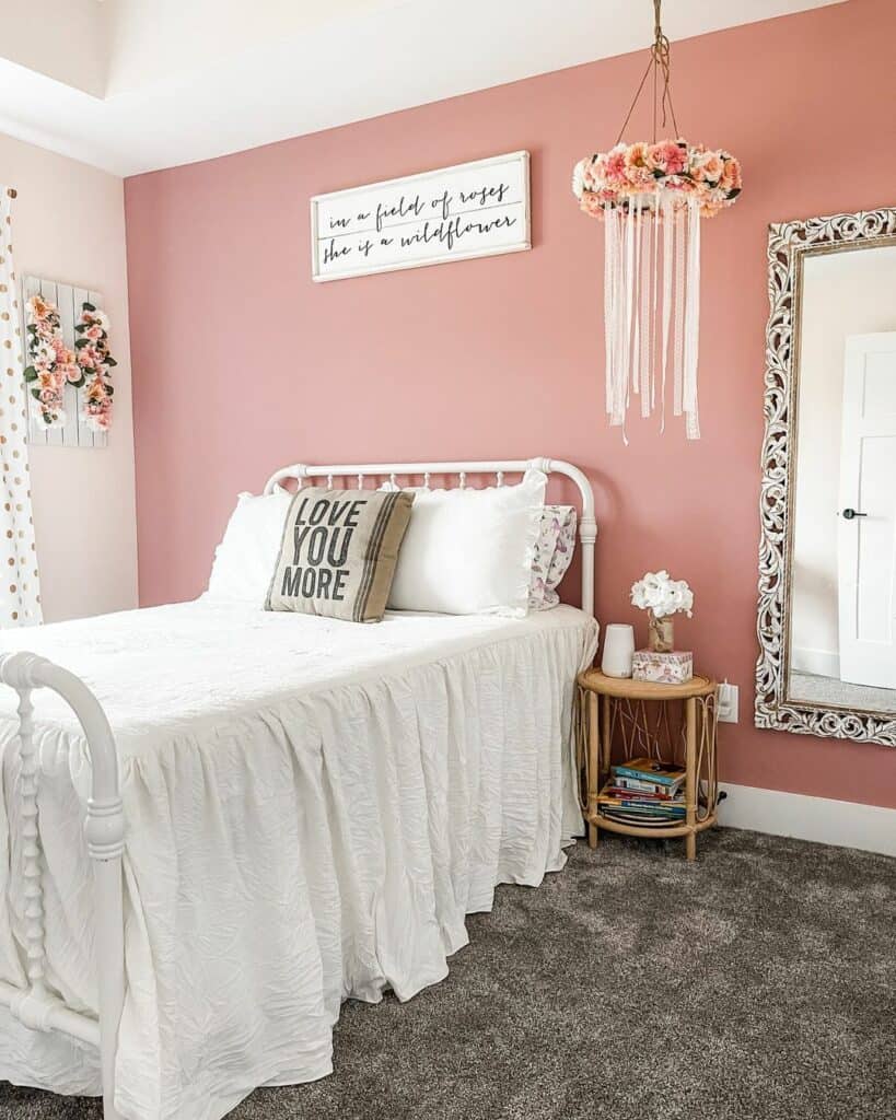 Pink Boho Girl's Bedroom With White Metal Bed