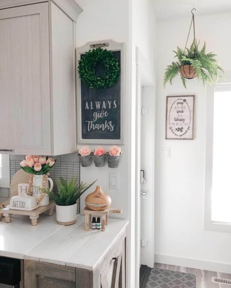 Pink Flowers and a Green Fern