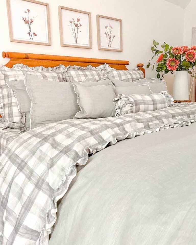 Plaid Bedding and Botanical Artwork Bedroom