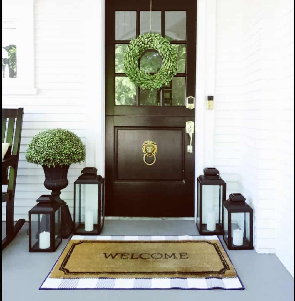 Porch With Black Doors and White Trim