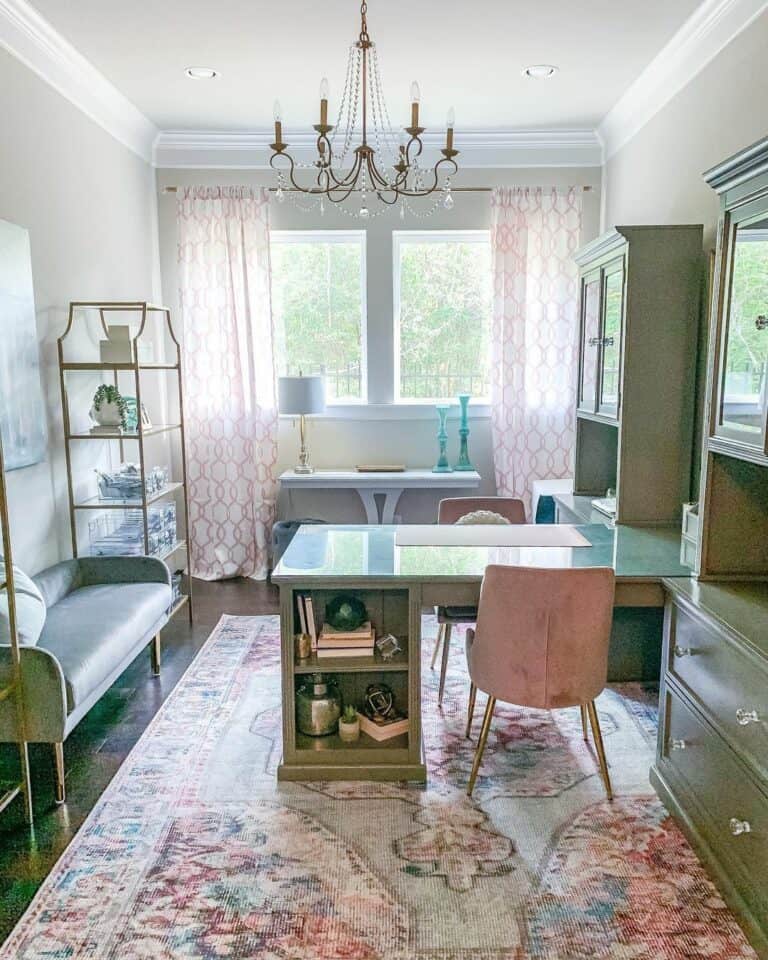 Rectangular Desk Between Pale Pink Chairs