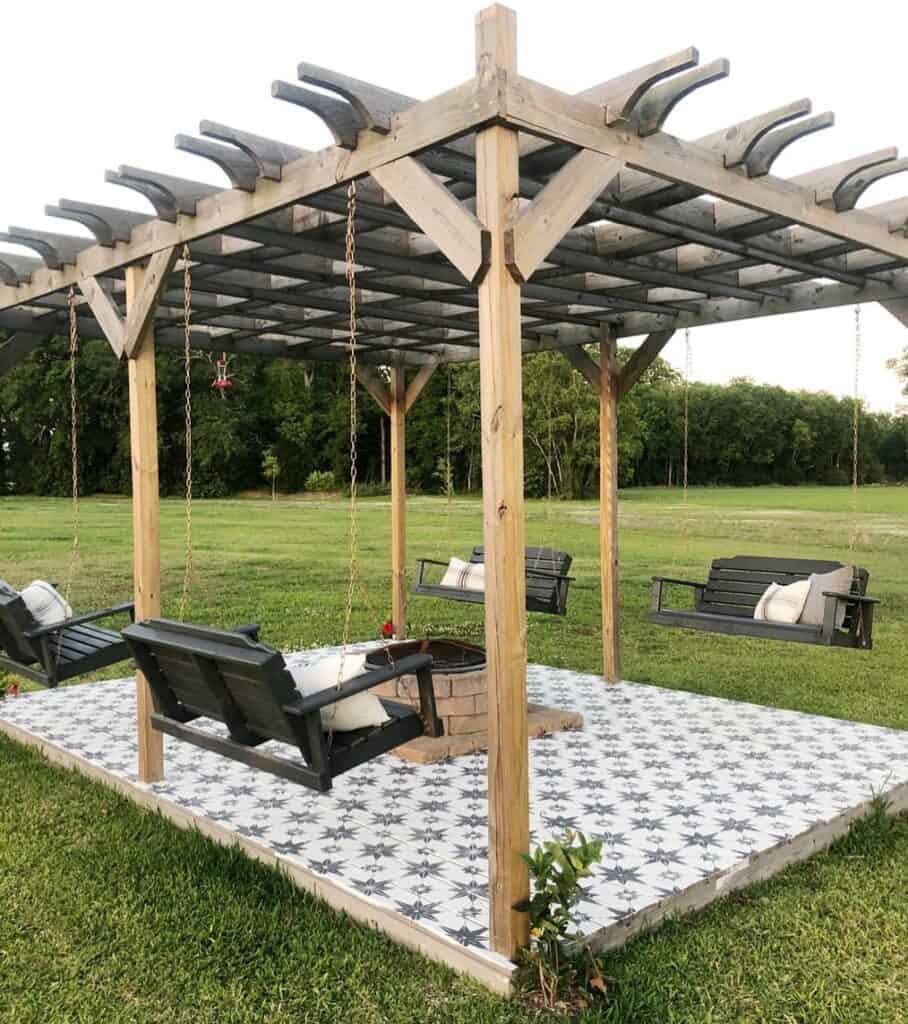 Red Brick Fire Pit Under Wooden Pergola